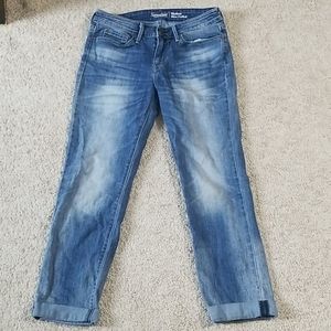 Faded cuffed blue jeans